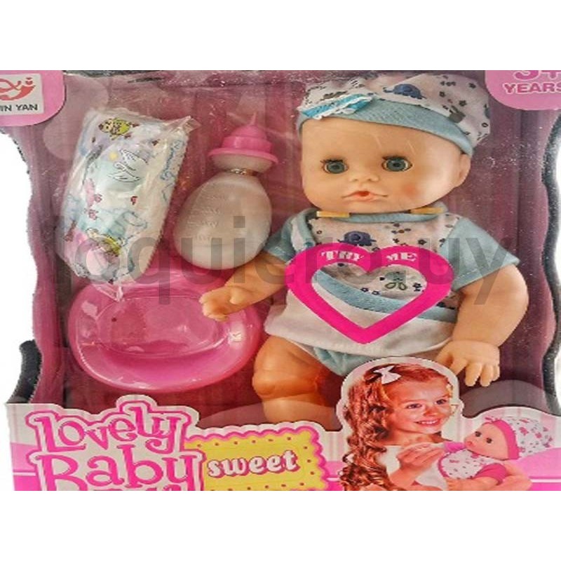 Bebé c/accesorios en  caja    .