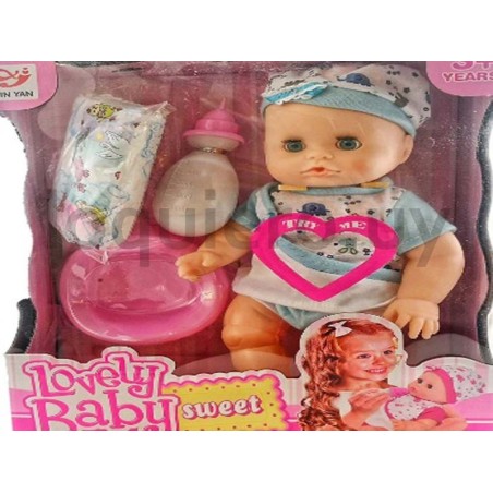 Bebé c/accesorios en  caja    .