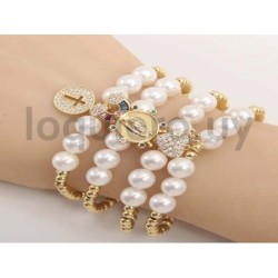 Pulsera con perlas y dije     .